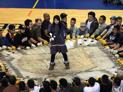 The blanket toss is one of the many events that occur during the annual World Eskimo Indian Olympics in Fairbanks, Alaska. 
