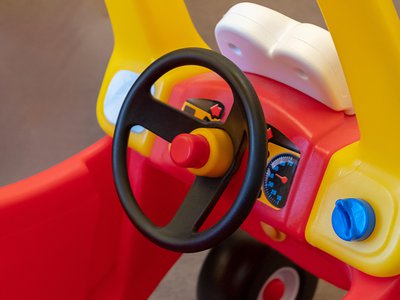 The little red car with the yellow roof that is propelled by foot power has been a hit with young children since its creation in 1979.