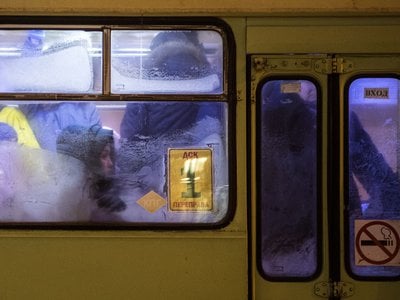 Commuters behind frozen bus windows in Yakutsk, known as the coldest city in the world
