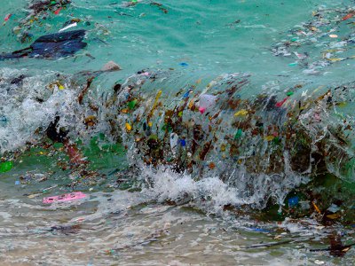A wave carrying plastic washes up in Thailand.&nbsp;For microbes in the ocean, floating plastic is a new potential ecosystem. And those microbes include pathogens that can make people sick.&nbsp;