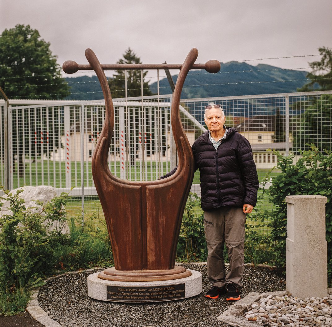 Frumin with his sculpture of King David’s harp at the former site of Givat Avoda. Frumin took his first art class at the camp and grew up to be a renowned artist based in Israel.