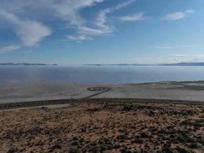 Robert Smithson, Spiral Jetty (1970). Great Salt Lake, Utah, USA. Mud, precipitated salt crystals, rocks, water. 1,500 ft. (457.2 m) long and 15 ft. (4.6 m) wide. Collection Dia Art Foundation. Photograph: William T. Carson, 2020