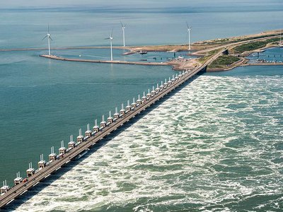 The Oosterscheldekering (Eastern Scheldt storm surge barrier), between the islands Schouwen-Duiveland and Noord-Beveland, is the largest of the 13 ambitious Delta Works series of dams and storm surge barriers, designed to protect the Netherlands from flooding from the North Sea.