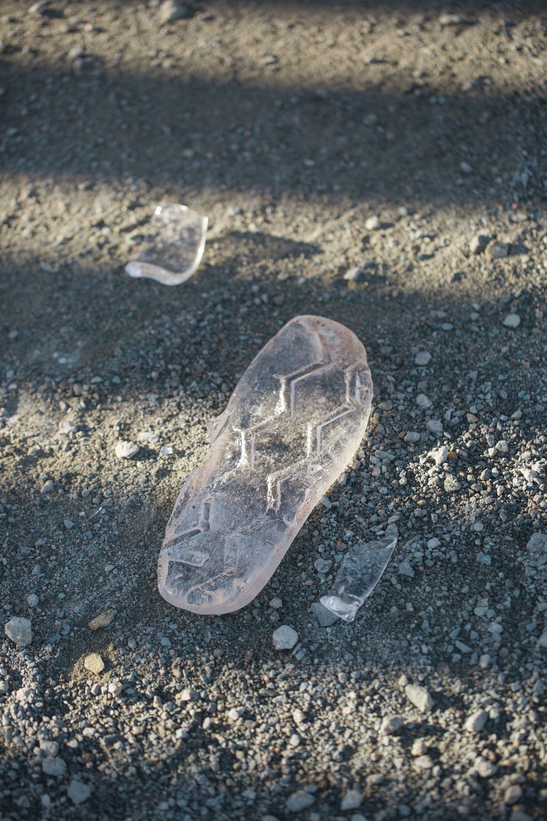 Artist Tanya Aguiniga's broken, glass huarache shoe