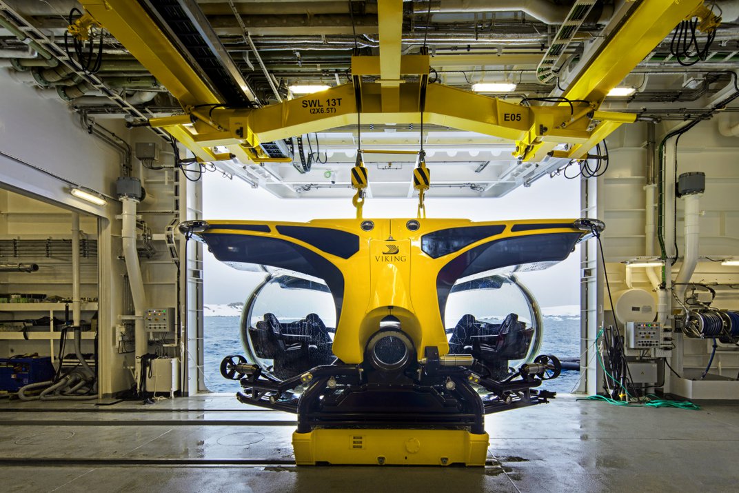 Yellow submarine in ship hangar